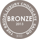 Delysia Chocolatier was awarded a Bronze Medal by the International Chocolate Salon in their Bridal Luxury Chocolate Salon Best for the Wedding Reception category for our Cowboy boot molded chocolate.