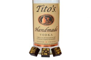 Enjoy a Tito's Vodka Delysia chocolate during your tailgating experience.