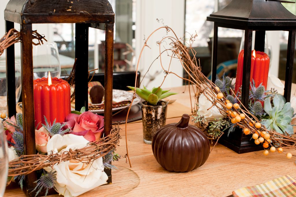 Autumn table with chocolate pumpkin