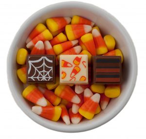 Halloween truffles in bowl of candy corn
